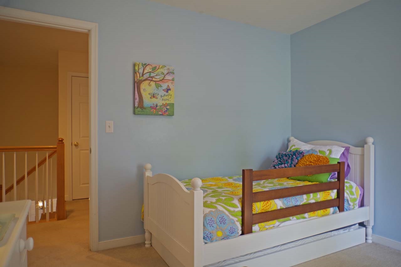 2009 Shepherds Ridge Road Charlottesville, VA 22901 - Photo 29 of 41 a view of a hallway with paintings on the wall