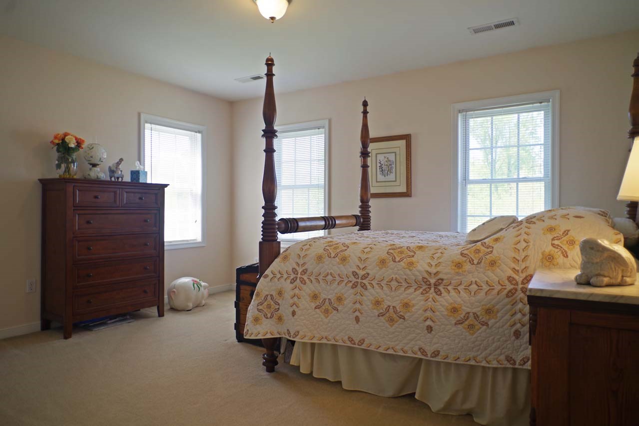 2009 Shepherds Ridge Road Charlottesville, VA 22901 - Photo 34 of 41 a bedroom with a bed and a dresser