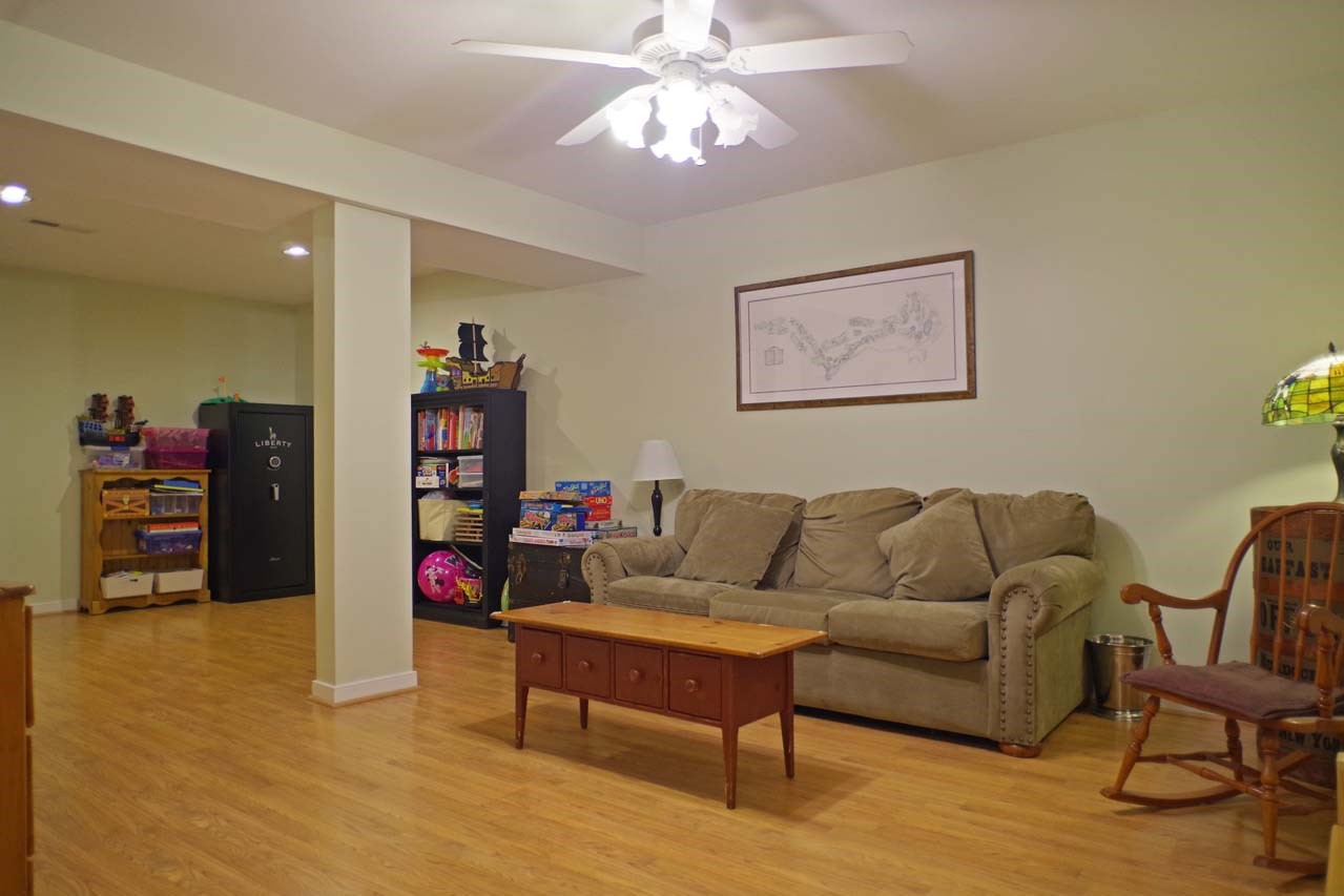 2009 Shepherds Ridge Road Charlottesville, VA 22901 - Photo 37 of 41 a living room with furniture and a flat screen tv