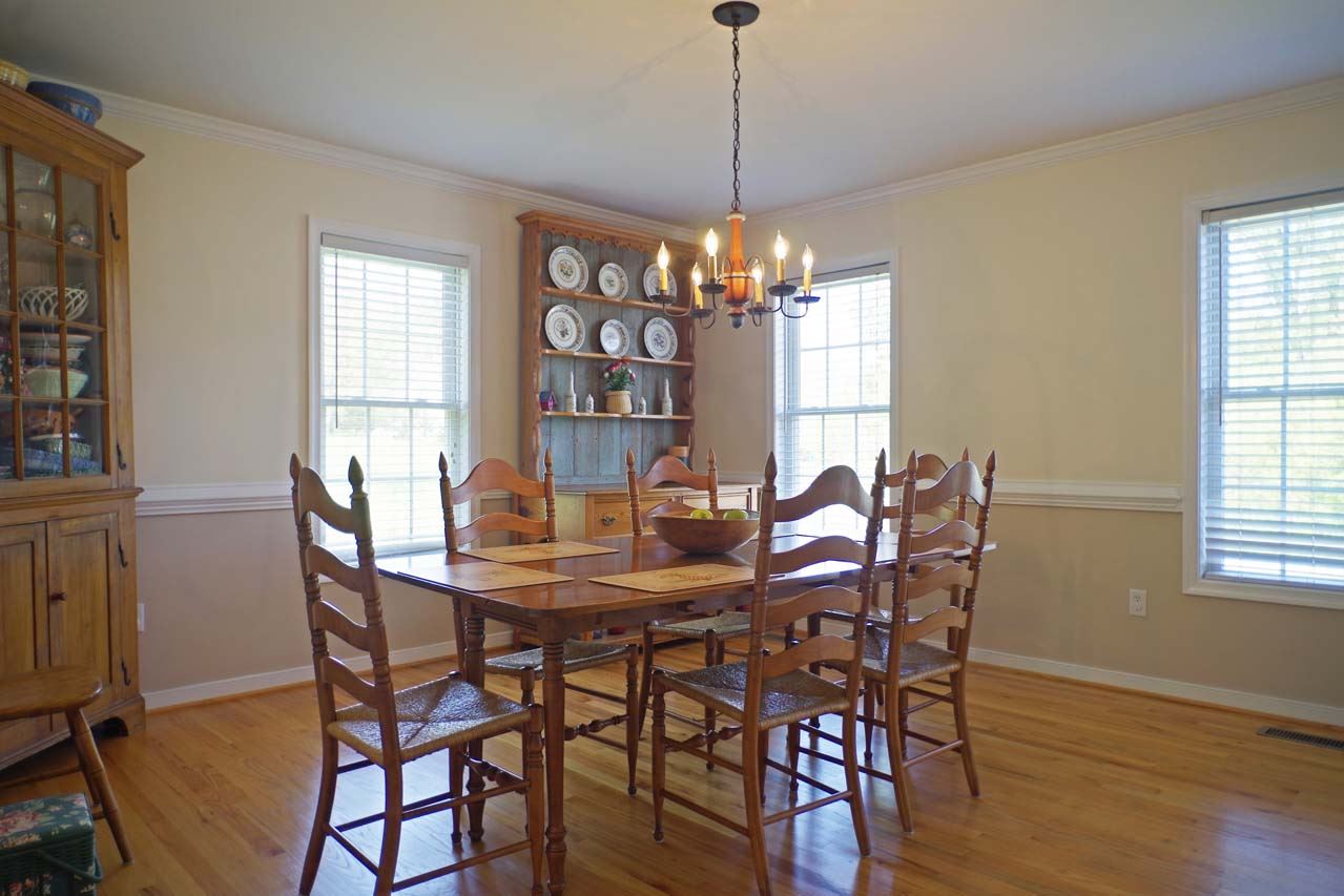 2009 Shepherds Ridge Road Charlottesville, VA 22901 - Photo 5 of 41 a view of a dining room with furniture window and wooden floor