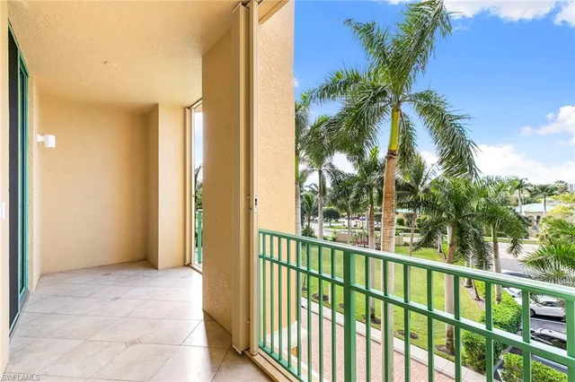 a bathroom with a granite countertop sink toilet a mirror and shower