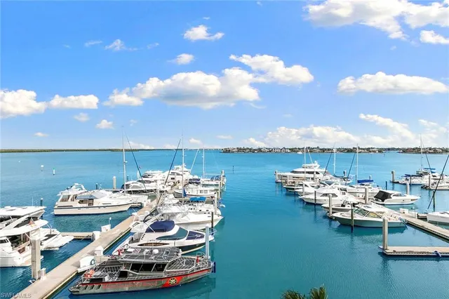 a view of a ocean with outside dining space