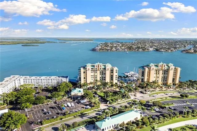 a view of a city with lawn chairs