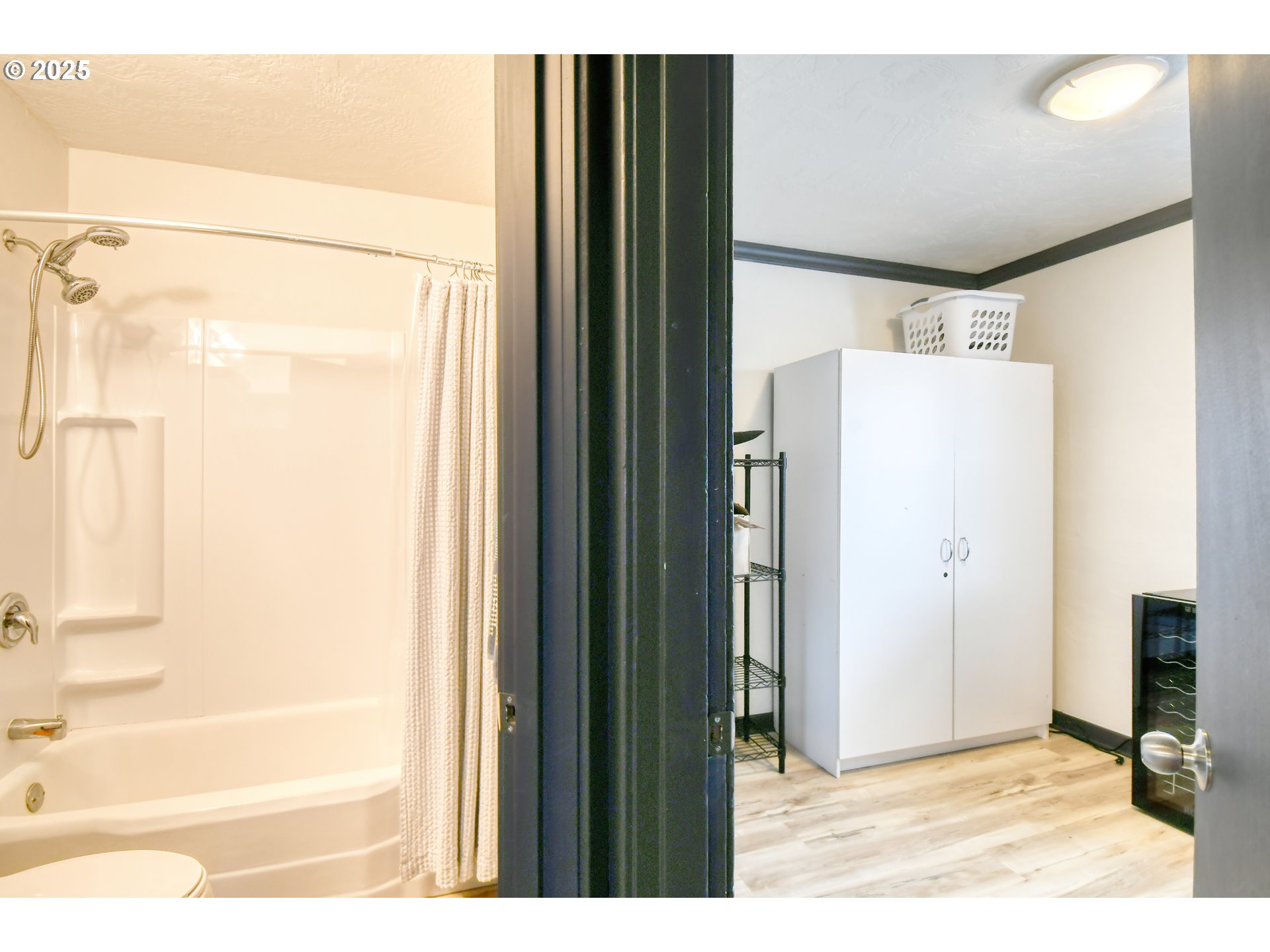 709 Southwest 8th Street Pendleton, OR 97801 - Photo 13 of 24 a bathroom with a shower and a glass door