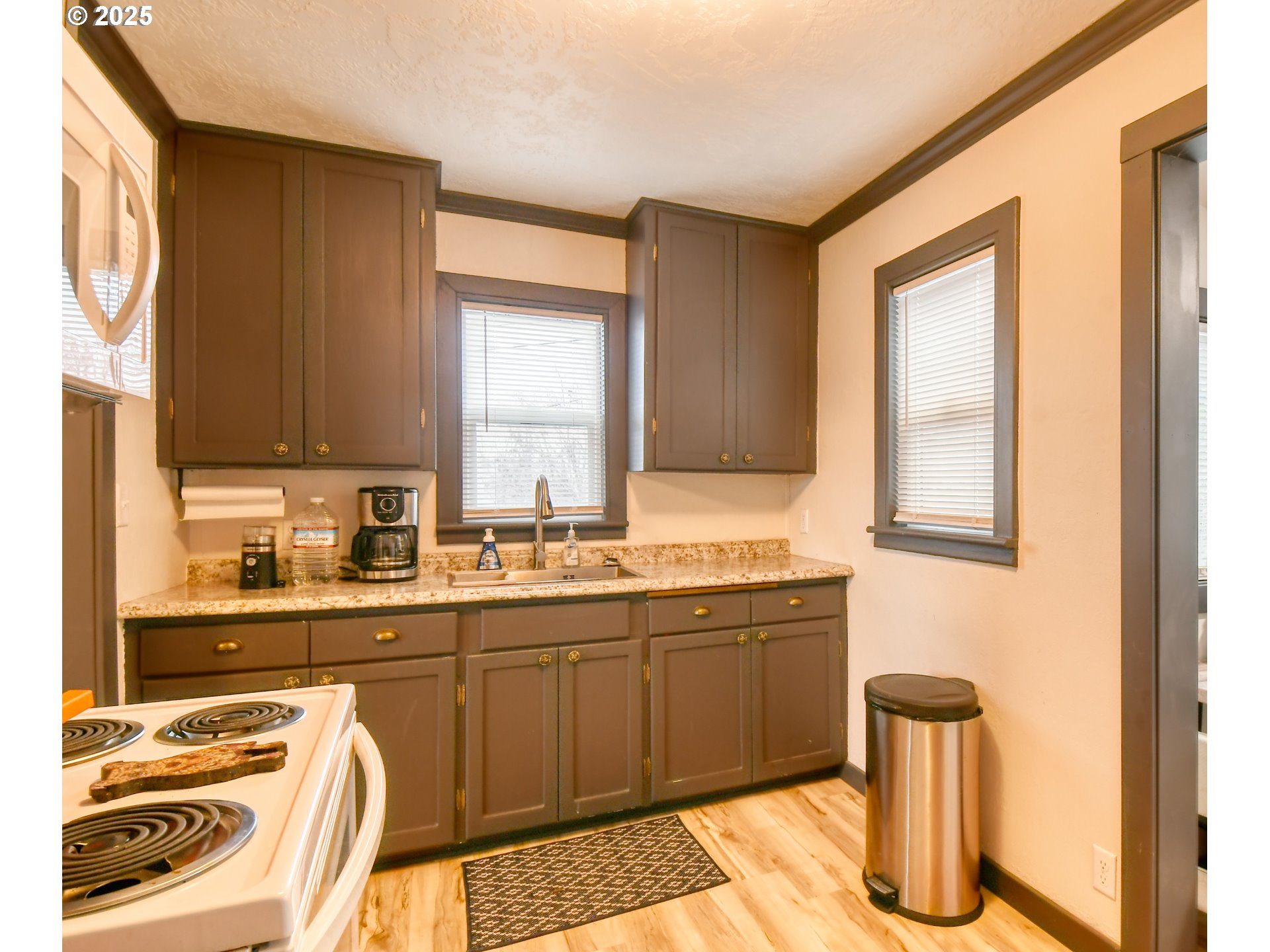 709 Southwest 8th Street Pendleton, OR 97801 - Photo 7 of 24 a kitchen with a sink and cabinets