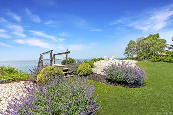 a view of a balcony with wooden floor