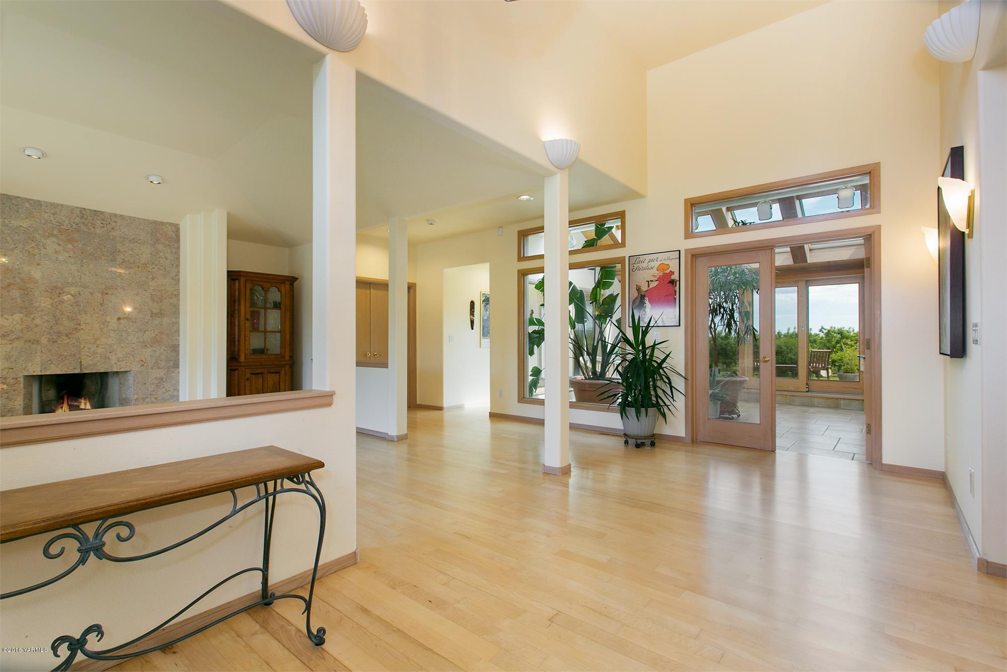 13990 Gilbert Road Yakima, WA 98903 - Photo 2 of 29 a view of an entryway with wooden floor and a potted plant