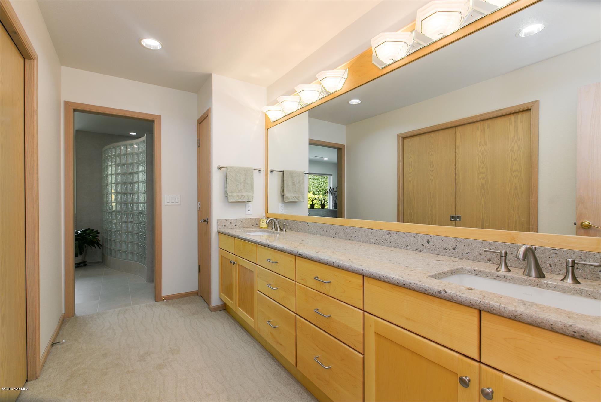 13990 Gilbert Road Yakima, WA 98903 - Photo 15 of 29 a bathroom with a granite countertop sink mirror and double