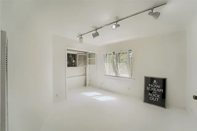 a view of livingroom with furniture and front door