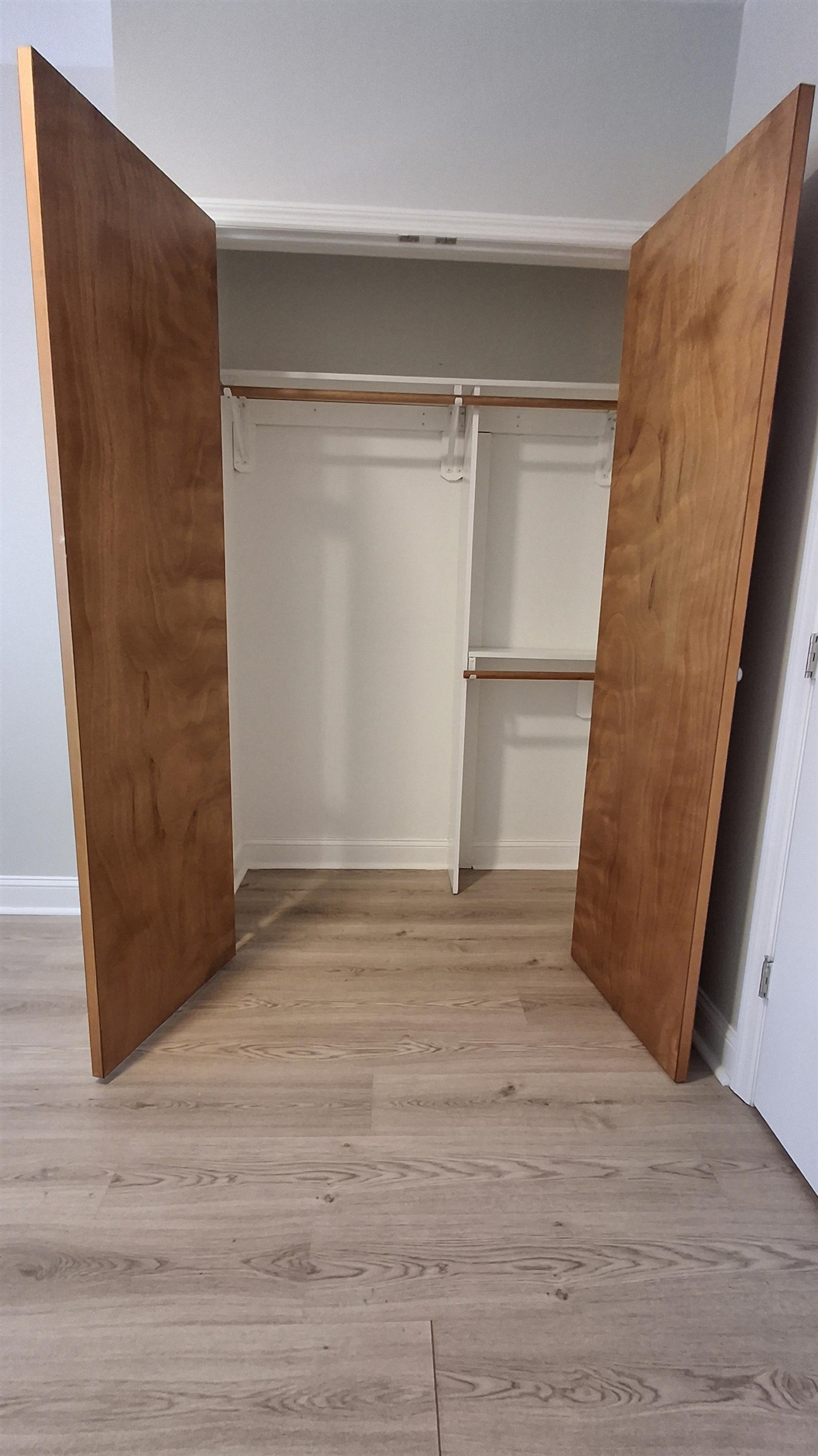 404 Madison Street, Unit 3L Hoboken, NJ 07030 - Photo 9 of 12 a view of an empty room with wooden floor and door