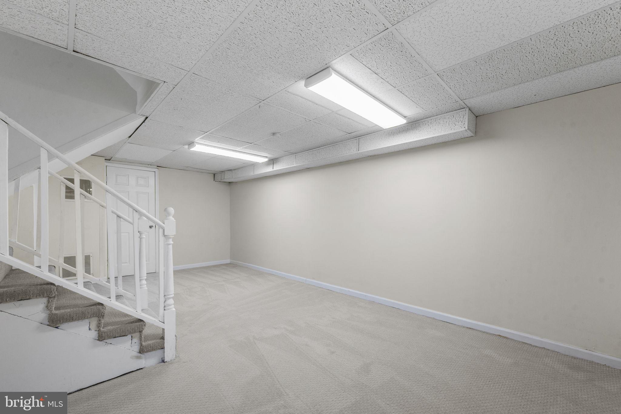 4216 Sideburn Road Fairfax, VA 22030 - Photo 37 of 47 Lower Level Family Room, New Carpet and Ceiling