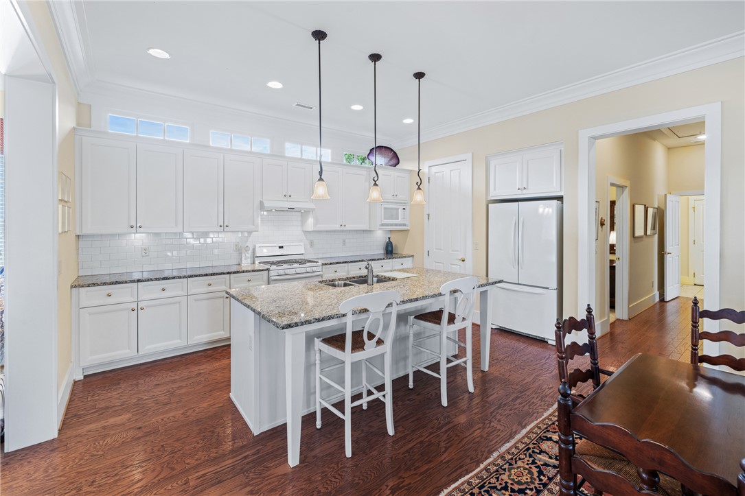 132 Sikes Avenue Clemson, SC 29631 - Photo 6 of 25 Windows above cabinets flood the space with natural light