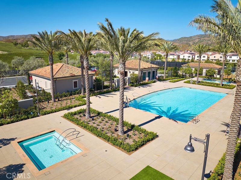 128 Oakstone Irvine, CA 92618 - Photo 11 of 13 a view of a swimming pool with a patio