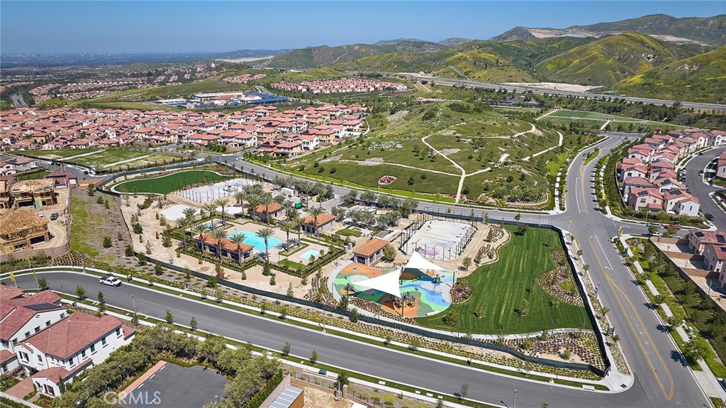 128 Oakstone Irvine, CA 92618 - Photo 10 of 13 an aerial view of residential houses with outdoor space