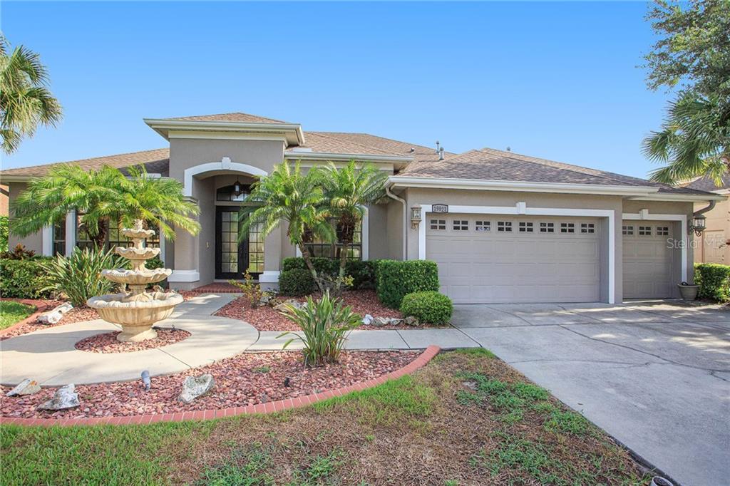 GORGEOUS 4 bedroom 3 bathroom pool home in the gated Strathmore section of Oakstead!