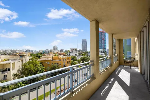 a view of a balcony with city view