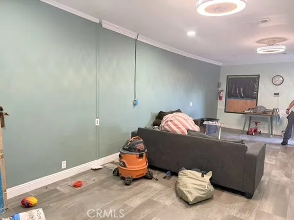 a living room with furniture and a table