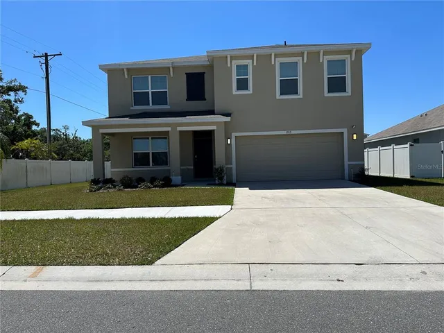 a view of outdoor space yard and front view of a house