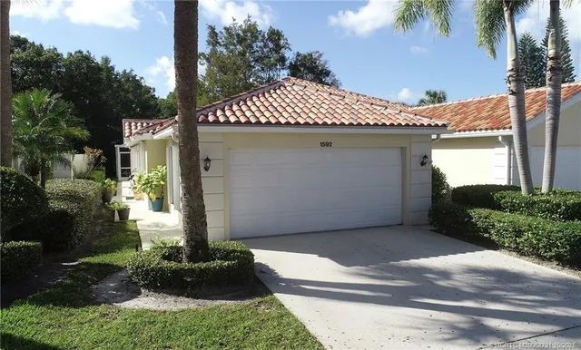 an aerial view of a house having yard