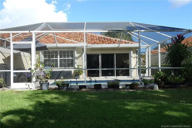 a view of a swimming pool with a porch