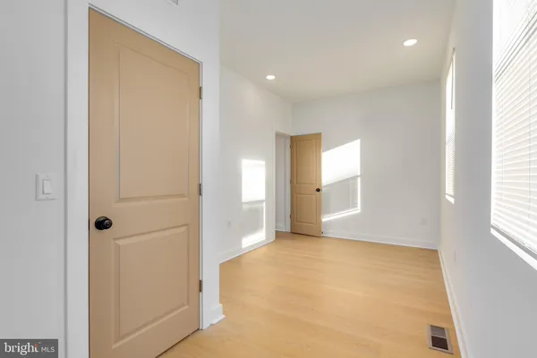 a view of an empty room and window