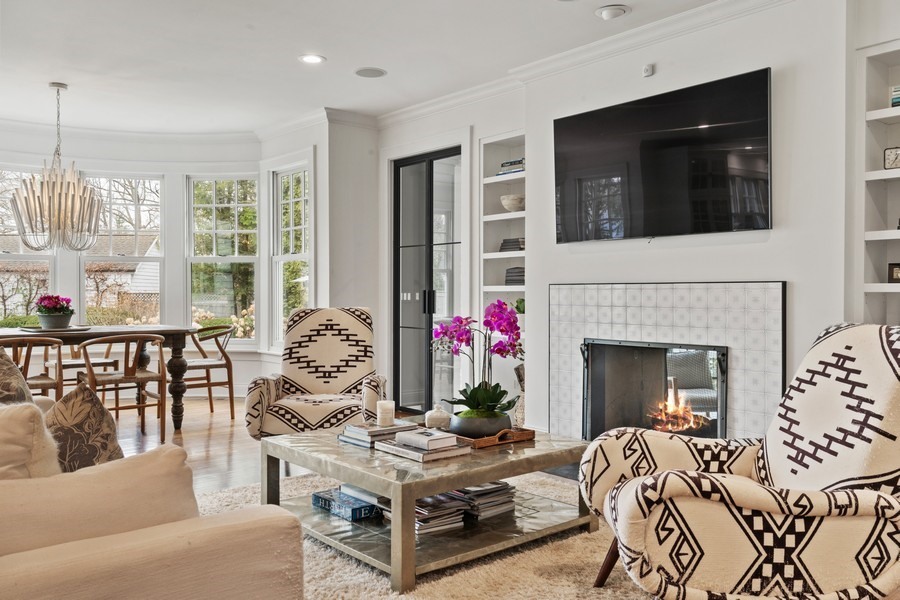 346 Sheridan Road Winnetka, IL 60093 - Photo 11 of 59 a living room with furniture fireplace and flat screen tv