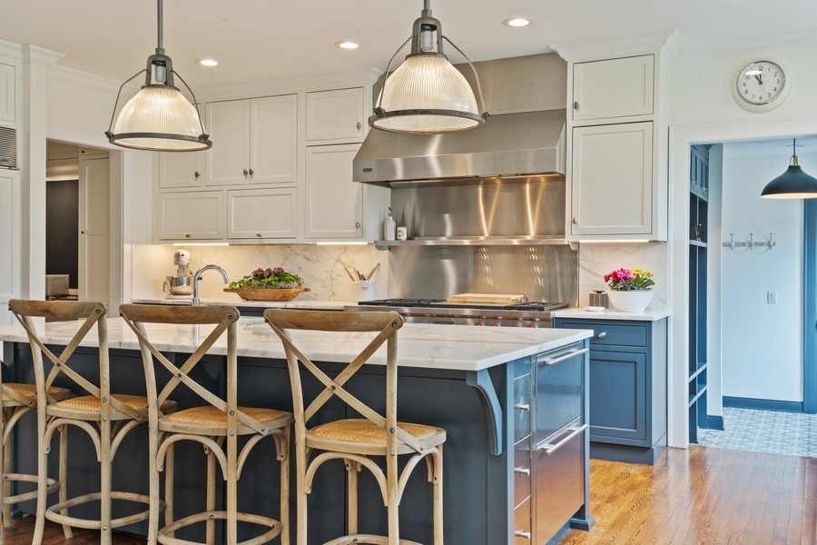 346 Sheridan Road Winnetka, IL 60093 - Photo 17 of 59 a kitchen with a sink cabinets and wooden floor