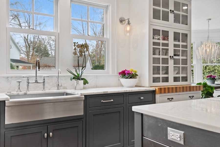346 Sheridan Road Winnetka, IL 60093 - Photo 19 of 59 a spacious bathroom with a sink and a mirror