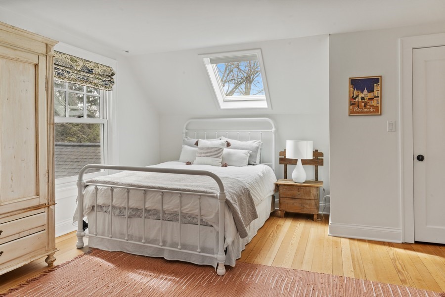 346 Sheridan Road Winnetka, IL 60093 - Photo 37 of 59 a bedroom with a bed and a window