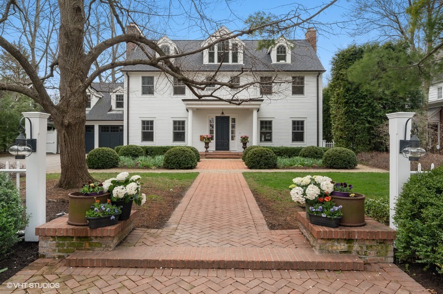 346 Sheridan Road Winnetka, IL 60093 - Photo 46 of 59 a front view of a house with garden