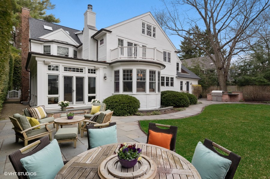 346 Sheridan Road Winnetka, IL 60093 - Photo 50 of 59 a view of a patio with couches table and chairs and potted plants