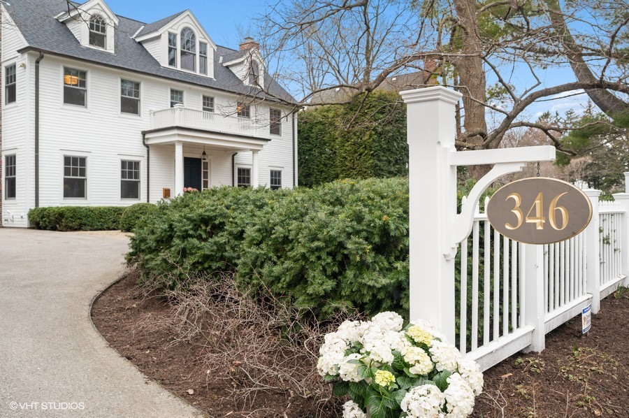 346 Sheridan Road Winnetka, IL 60093 - Photo 51 of 59 a front view of a house with a yard and fountain