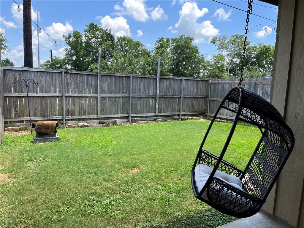 3203 Corporal Road College Station, TX 77845 - Photo 32 of 32 a view of a backyard with a garden and entertaining space