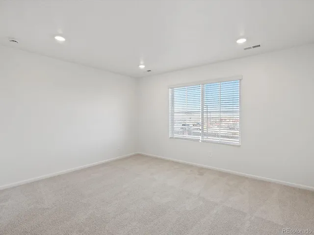 a bathroom with a double vanity sink and mirror
