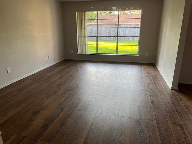 467 Buoy Road Webster, TX 77598 - Photo 14 of 23 Large family room with wood flooring