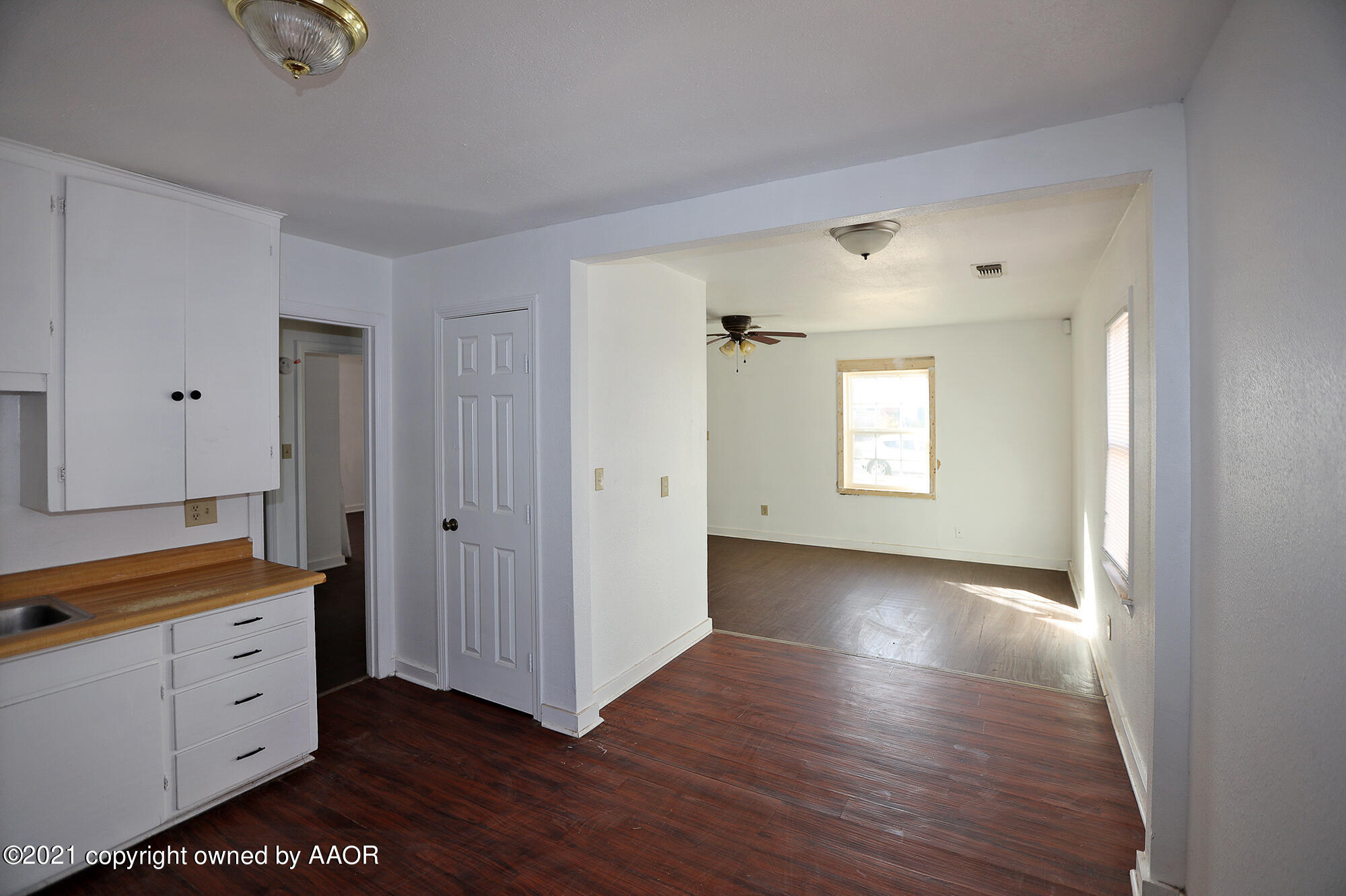 3603 South Ong Street Amarillo, TX 79110 - Photo 4 of 13 a view of a room with window and wooden floor
