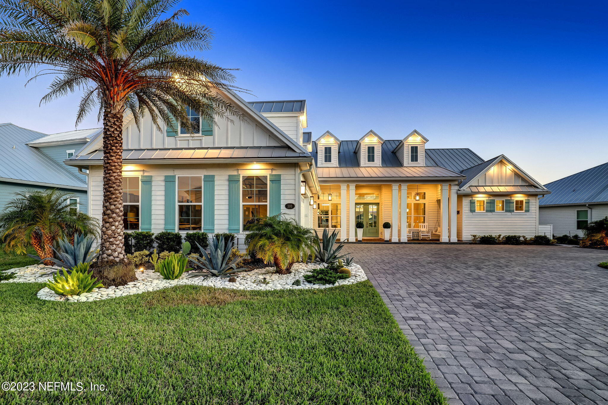a front view of house with yard outdoor seating and barbeque oven
