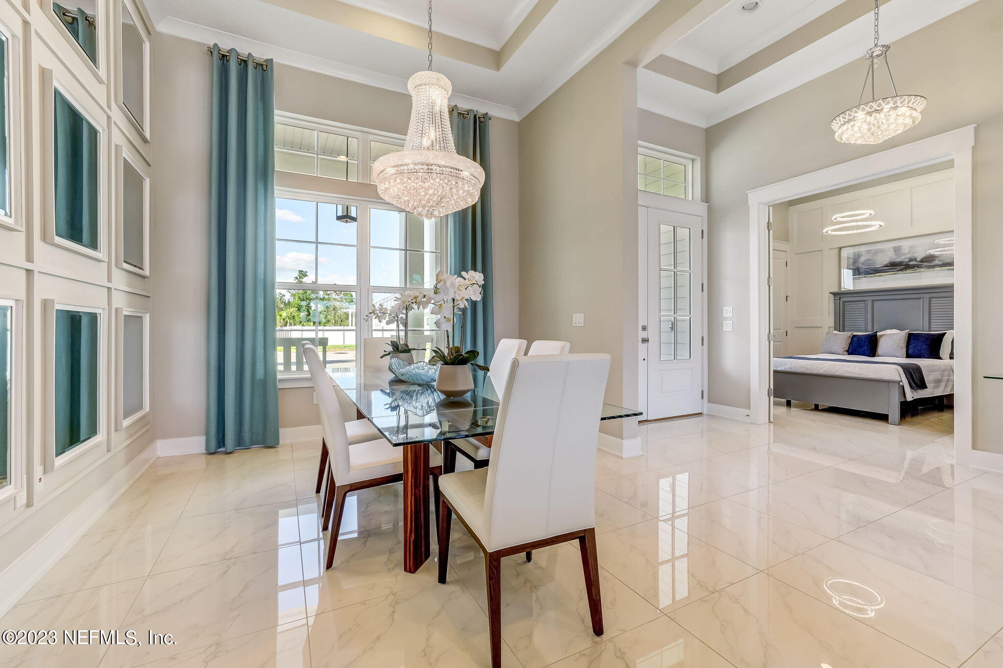 300 Topside Drive St. Johns, FL 32259 - Photo 13 of 121 a view of a dining room with furniture and a chandelier