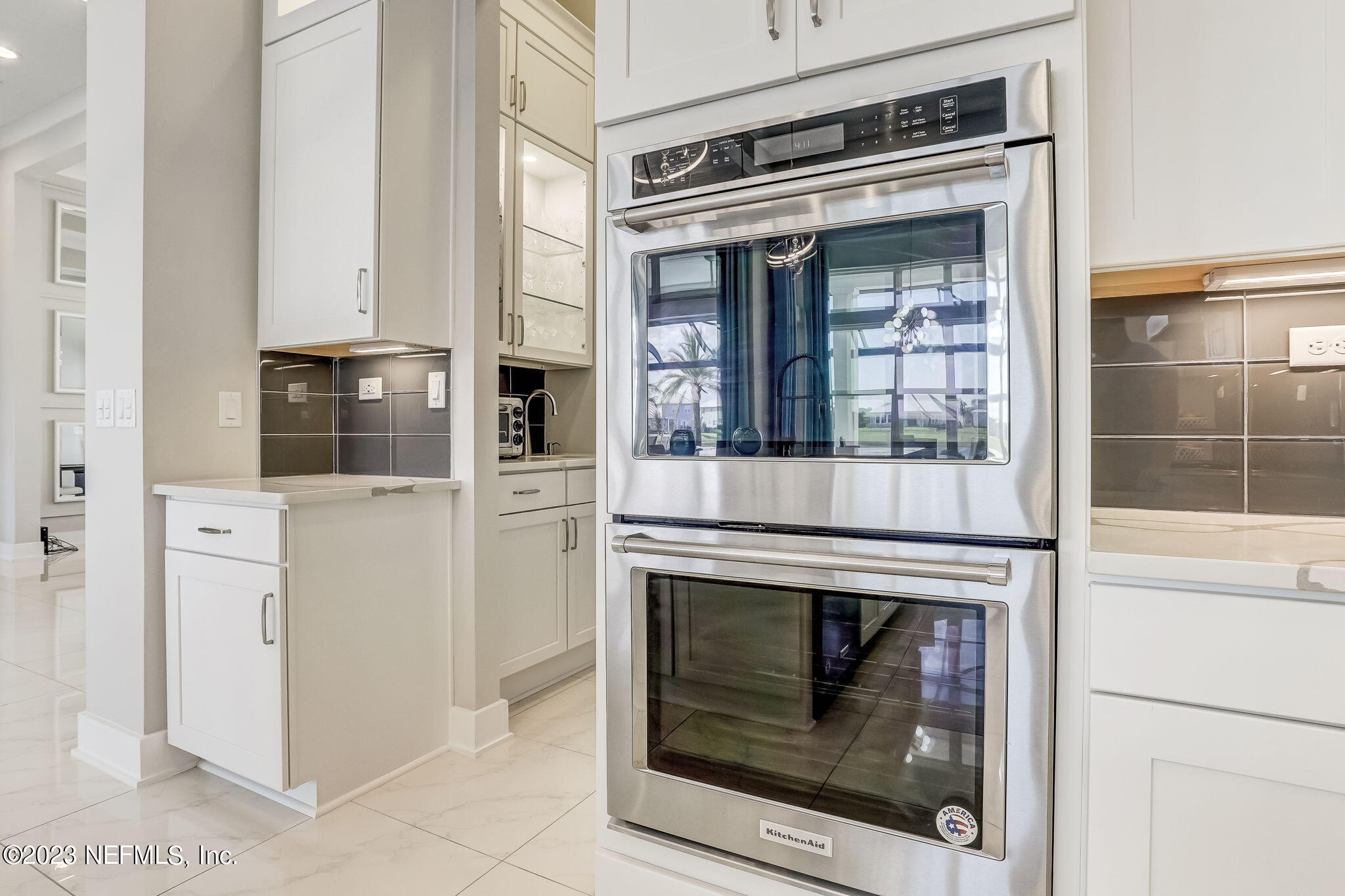 300 Topside Drive St. Johns, FL 32259 - Photo 23 of 121 a stove top oven sitting inside of a kitchen