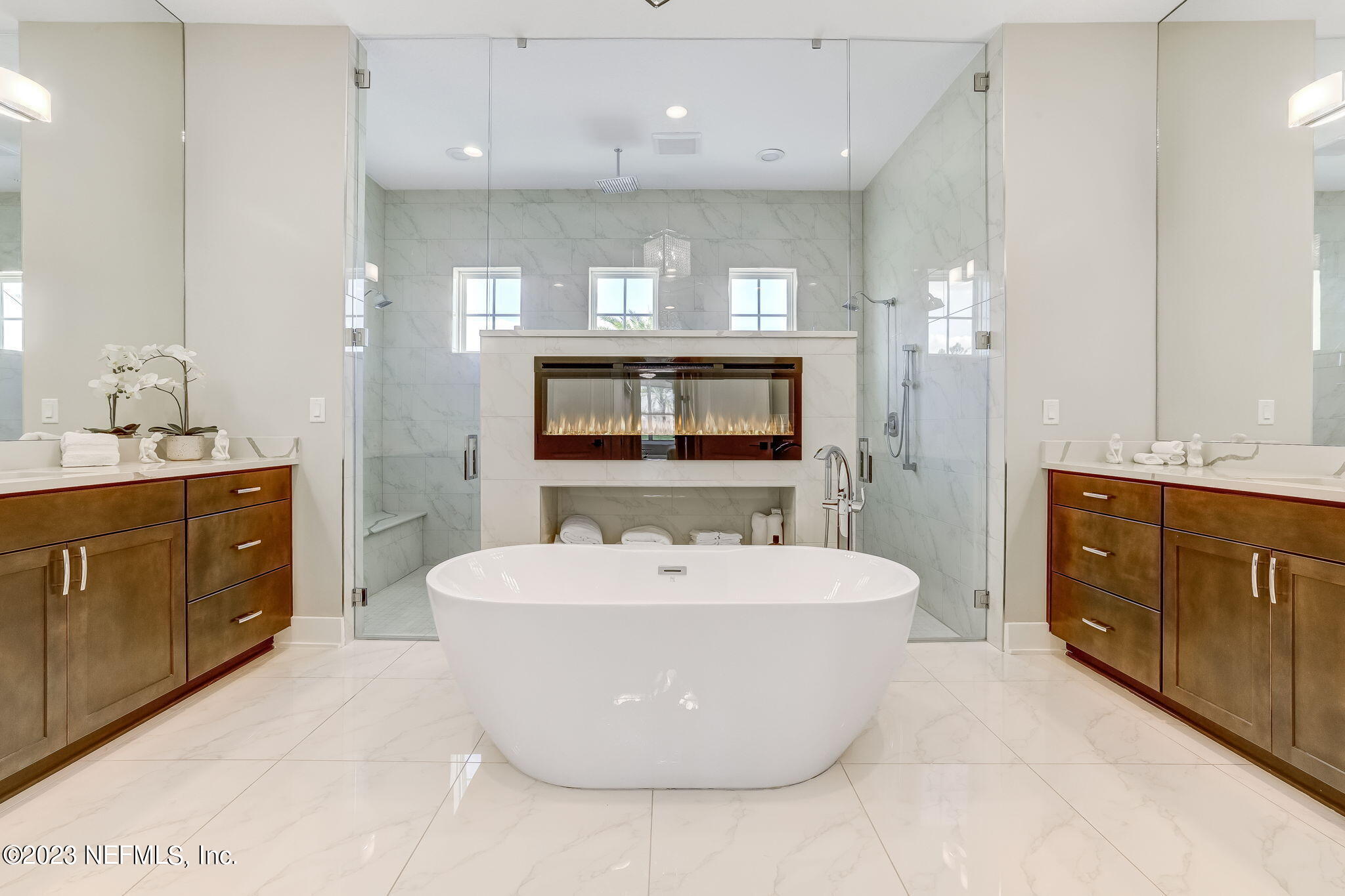 300 Topside Drive St. Johns, FL 32259 - Photo 37 of 121 a spacious bathroom with a double vanity sink a mirror a bathtub and shower