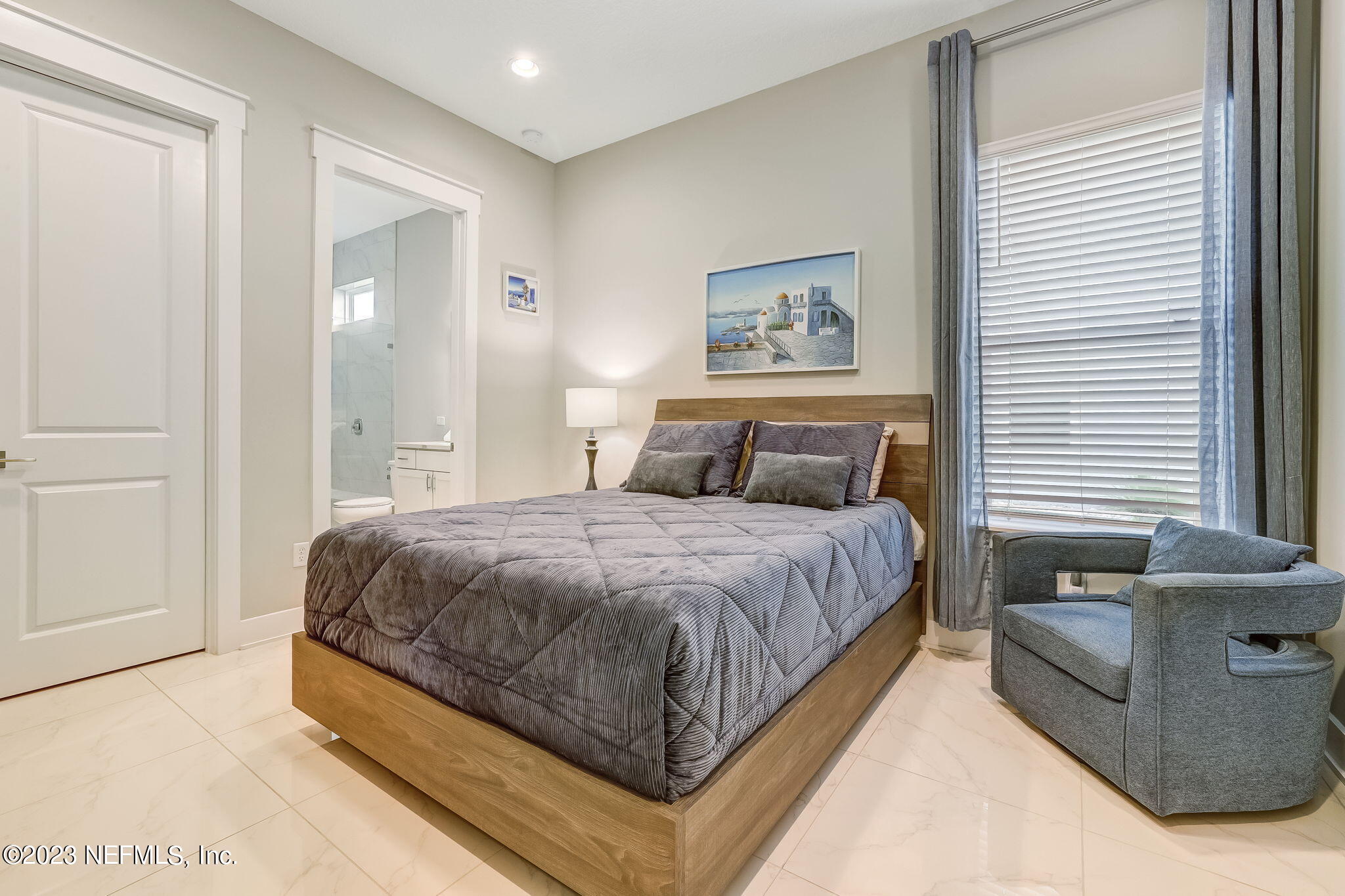 300 Topside Drive St. Johns, FL 32259 - Photo 46 of 121 a bedroom with a bed and a couch