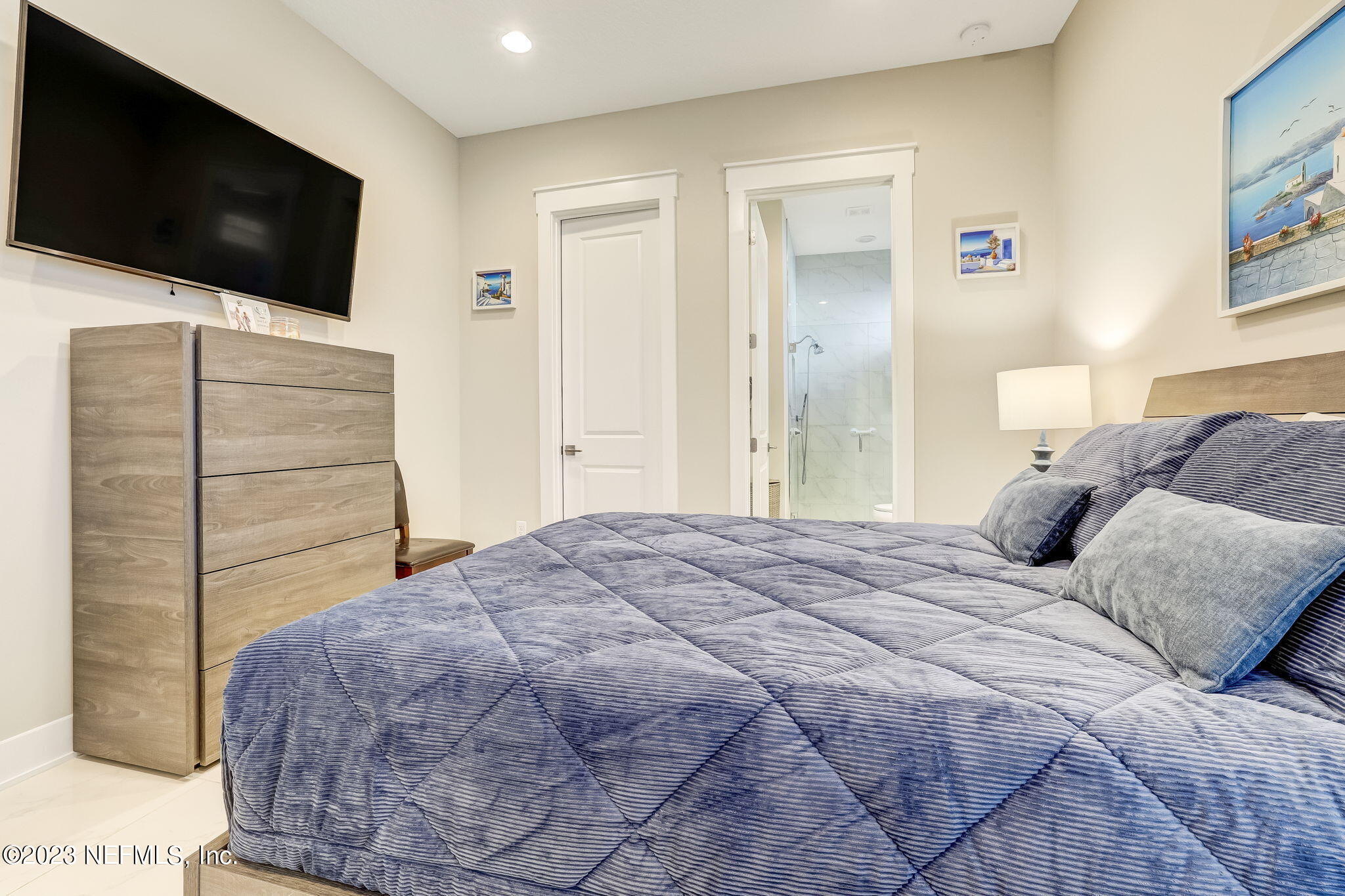 300 Topside Drive St. Johns, FL 32259 - Photo 47 of 121 a bedroom with a bed and a flat screen tv