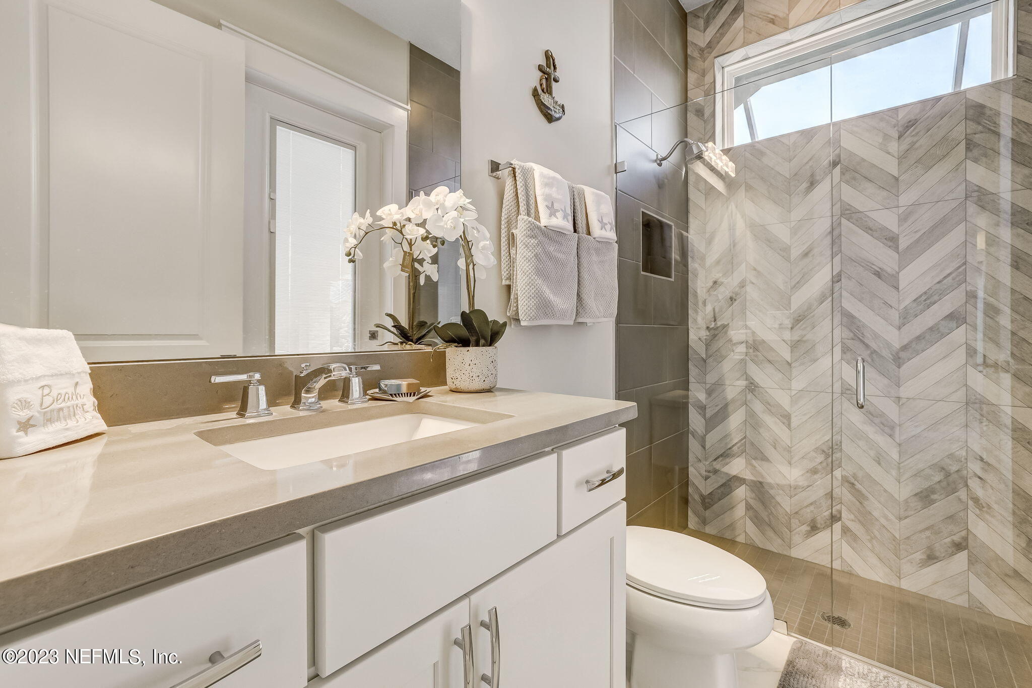300 Topside Drive St. Johns, FL 32259 - Photo 54 of 121 a bathroom with a granite countertop sink mirror vanity and toilet