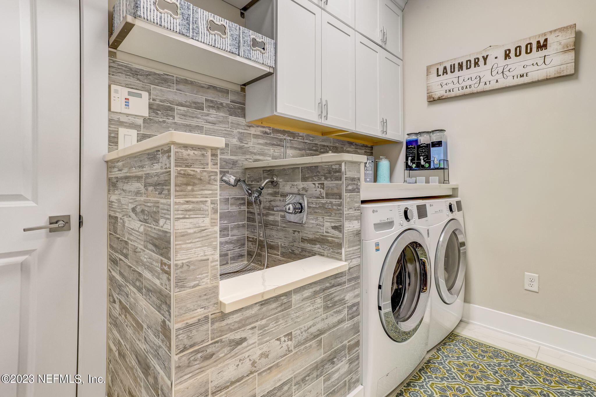 300 Topside Drive St. Johns, FL 32259 - Photo 56 of 121 a utility room with dryer and washer