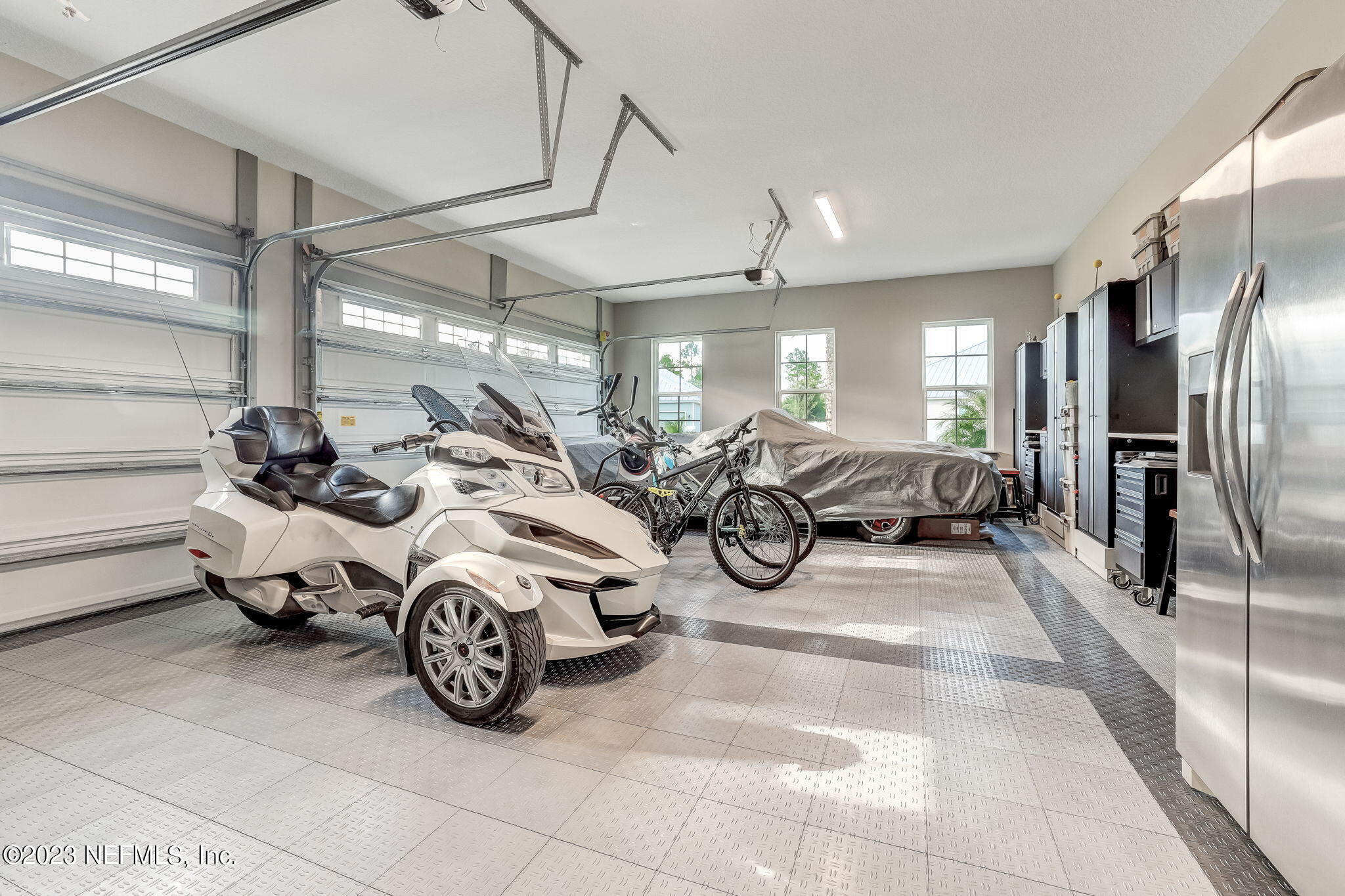 300 Topside Drive St. Johns, FL 32259 - Photo 58 of 121 a view of a garage with parked cars