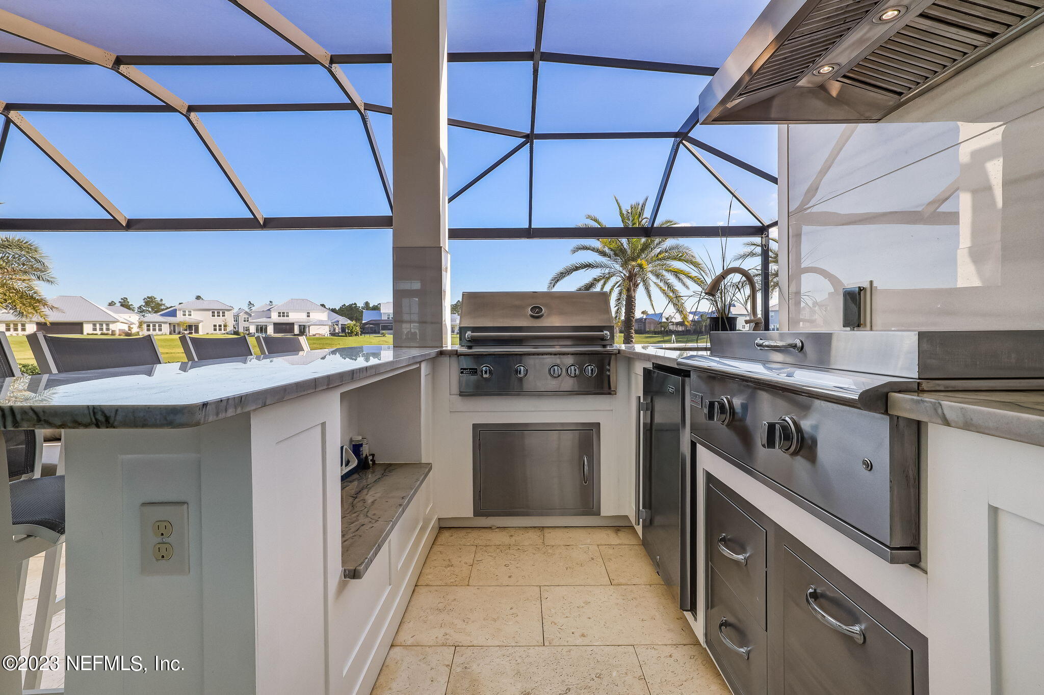300 Topside Drive St. Johns, FL 32259 - Photo 63 of 121 a kitchen with stainless steel appliances granite countertop a sink and stove