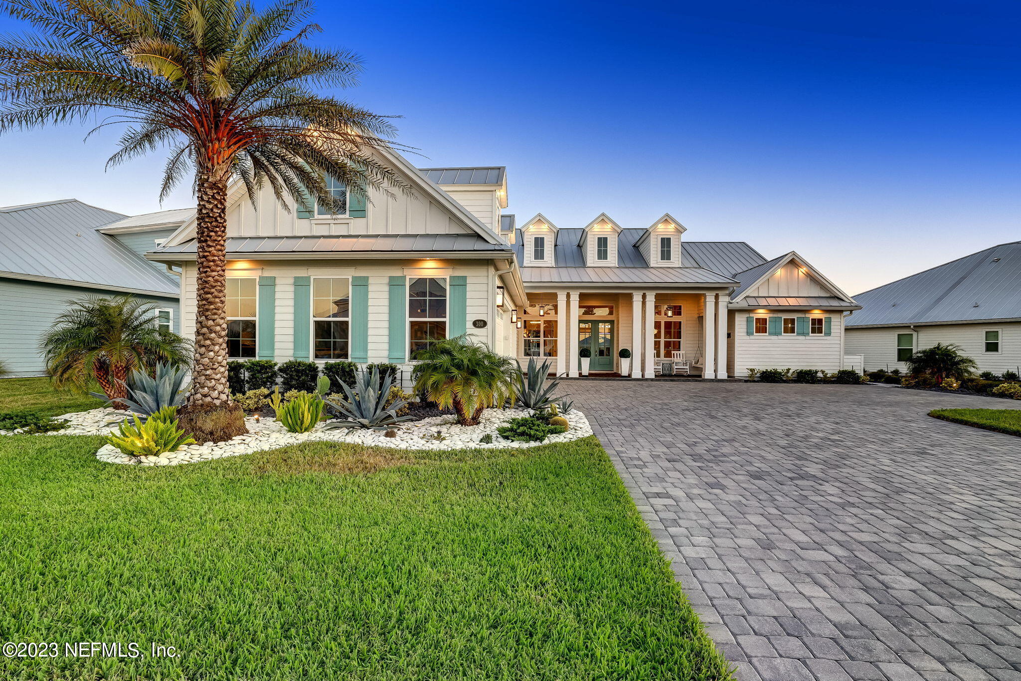 300 Topside Drive St. Johns, FL 32259 - Photo 80 of 121 a front view of a house with garden and sitting area