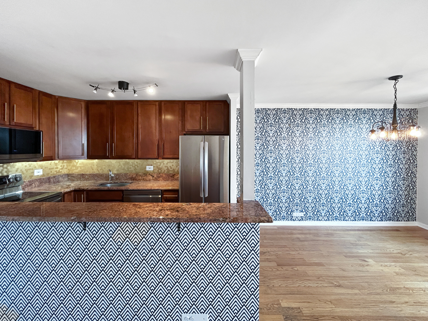 655 West Irving Park Road, Unit 3608 Chicago, IL 60613 - Photo 6 of 20 a view of a kitchen with wooden floor