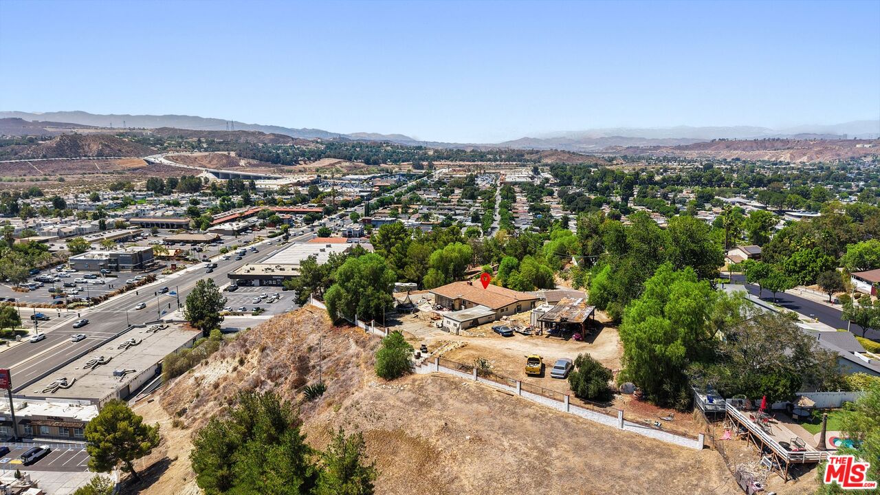 27420 Homyr Place Canyon Country, CA 91351 - Photo 5 of 8 an aerial view of residential houses with outdoor space