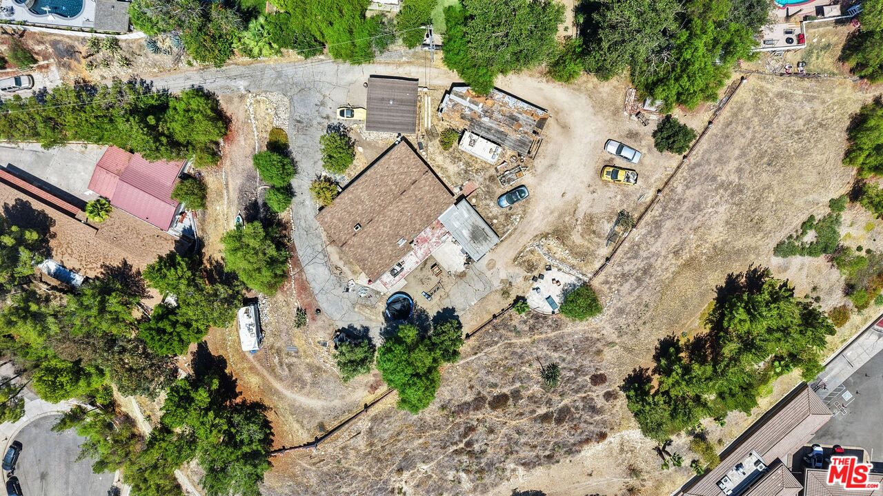 27420 Homyr Place Canyon Country, CA 91351 - Photo 8 of 8 an aerial view of a house with a yard
